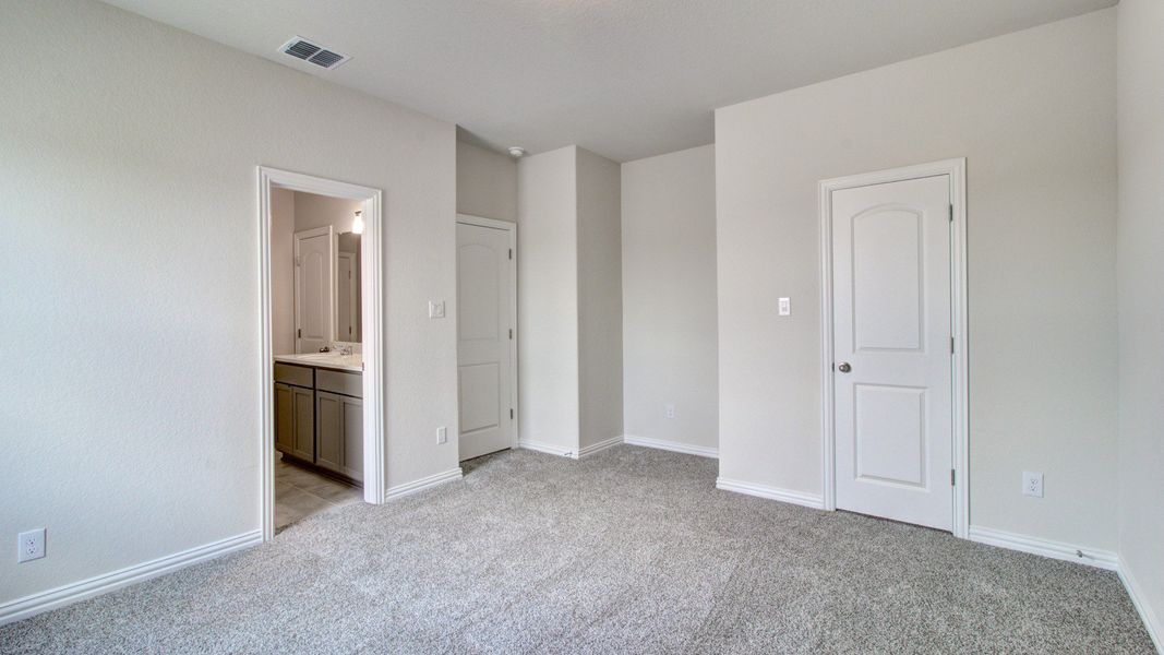 Furnished interior view inside a new home in The Crossvine, Schertz (Image 24).