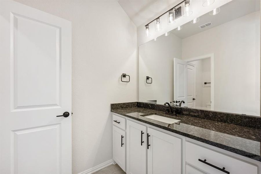 Furnished interior view inside a new home in Parks at Panchasarp Farms 65, Burleson (Image 13). Furnished interior view inside a new home in Parks at Panchasarp Farms 65, Burleson (Image 13).