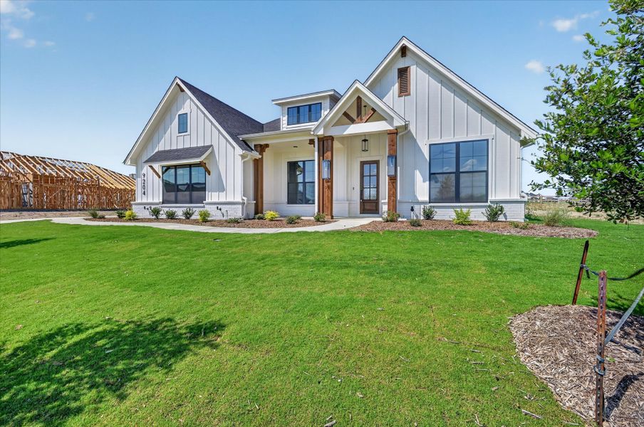 Front exterior of a new home in Paloma Ranches, Justin, TX, highlighting curb appeal (Image 17). Front exterior of a new home in Paloma Ranches, Justin, TX, highlighting curb appeal (Image 17).