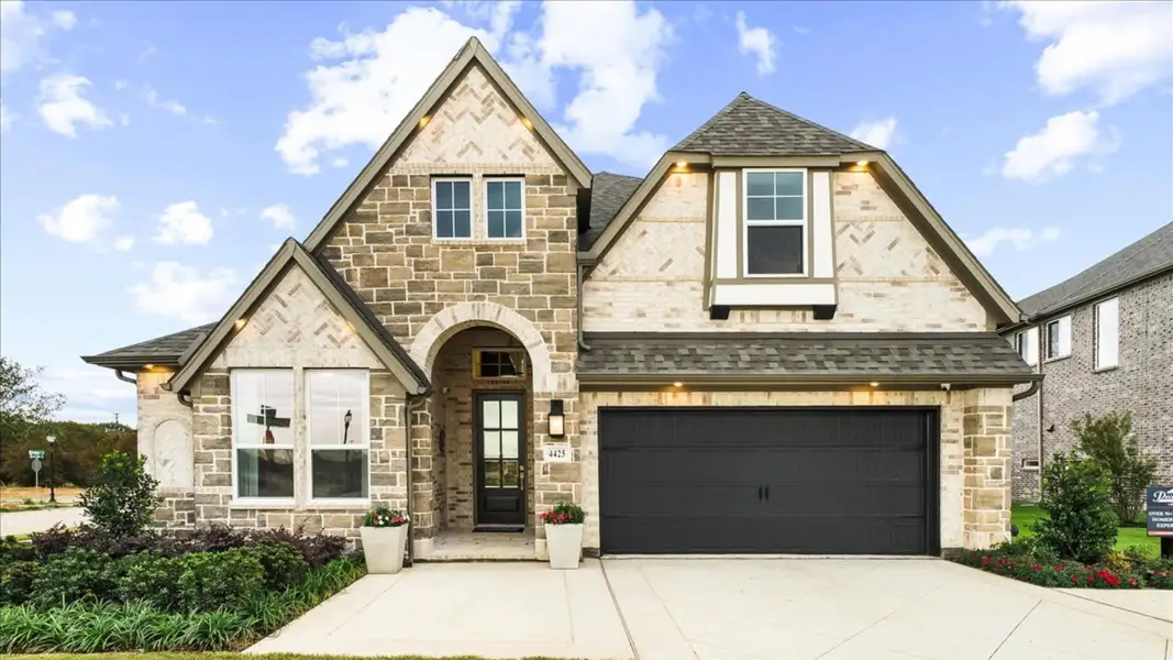 Representative exterior photo of a completed home built from the Grapevine II by Pacesetter Homes in Creekview Meadows, Pilot Point, TX (Image 1). Representative exterior photo of a completed home built from the Grapevine II by Pacesetter Homes in Creekview Meadows, Pilot Point, TX (Image 1).