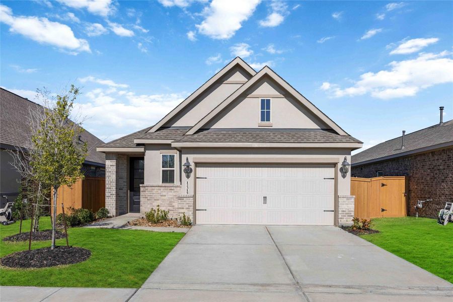 Front exterior of a new home in Balmoral: Avante Collection, Houston, TX, highlighting curb appeal (Image 2). Front exterior of a new home in Balmoral: Avante Collection, Houston, TX, highlighting curb appeal (Image 2).