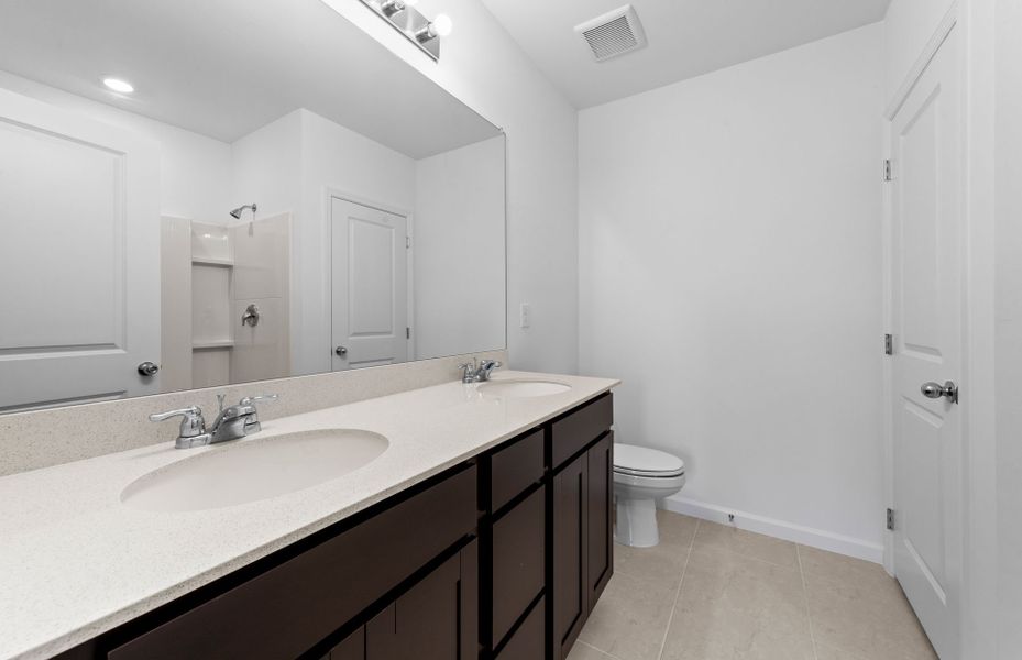 Furnished interior view inside a new home in Caloosa Cove, Labelle (Image 11).