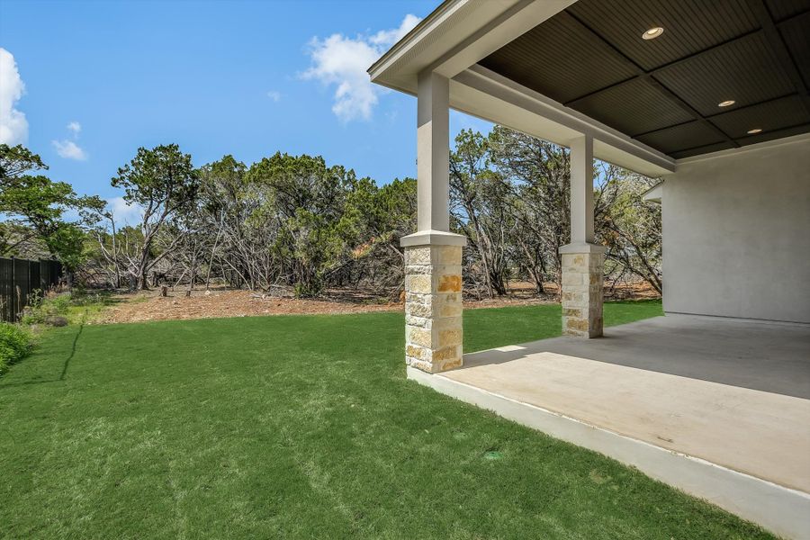 Exterior details and patio area of a home in The Hollows, Jonestown (Image 4).