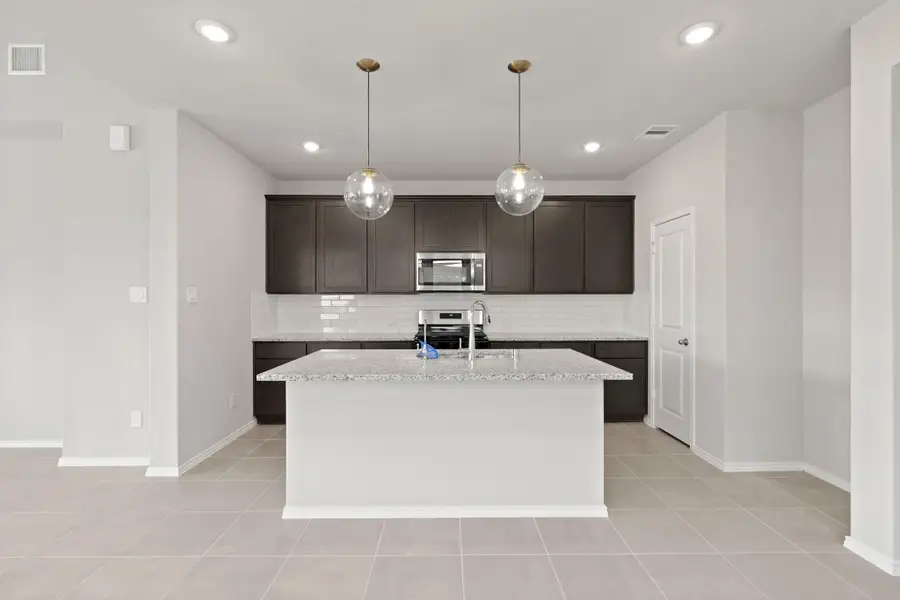 Furnished interior view inside a new home in The Trails, New Caney (Image 14).