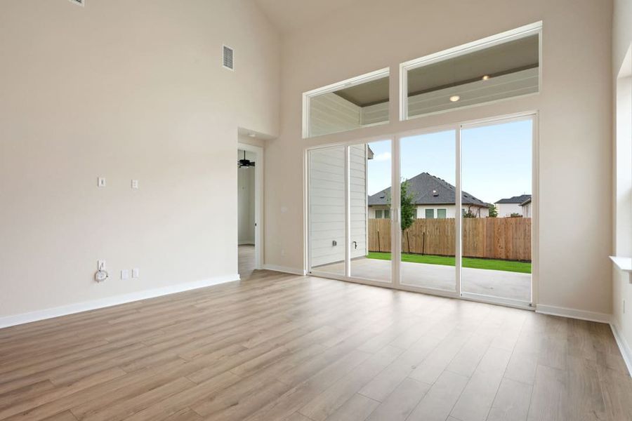 Spacious, unfurnished interior of a new home in Heritage, Dripping Springs (Image 23).