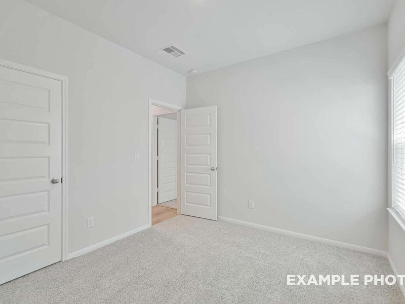 Spacious, unfurnished interior of a new home in Caney Creek Place, Conroe (Image 27).