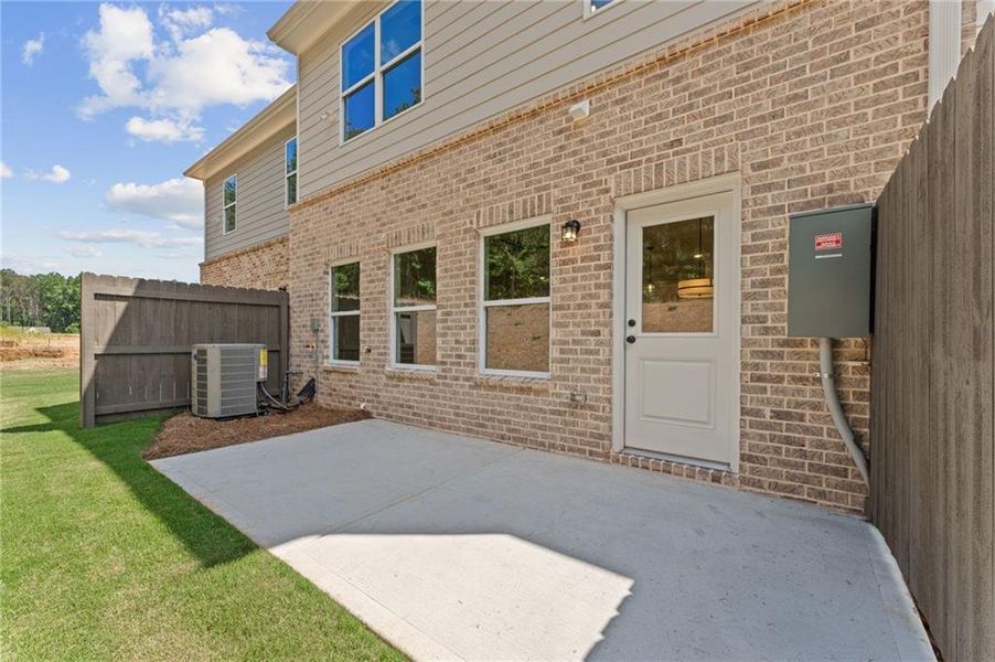 Exterior details and patio area of a home in Wildwood Place, Powder Springs (Image 3). Exterior details and patio area of a home in Wildwood Place, Powder Springs (Image 3).