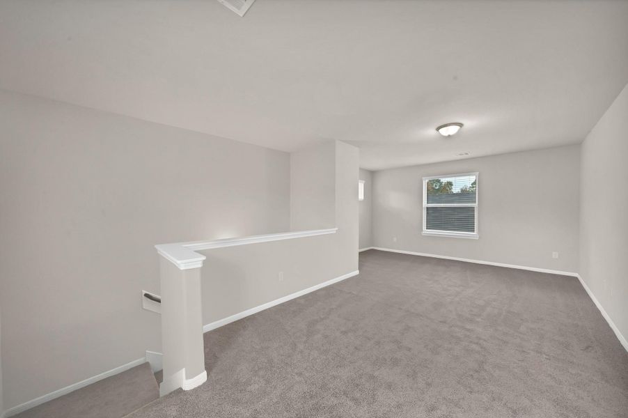 Spacious, unfurnished interior of a new home in Woodland Lakes, Houston (Image 22).