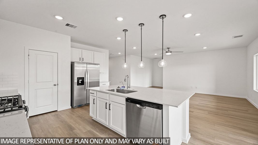 Furnished interior view inside a new home in Sunterra, Katy (Image 3).