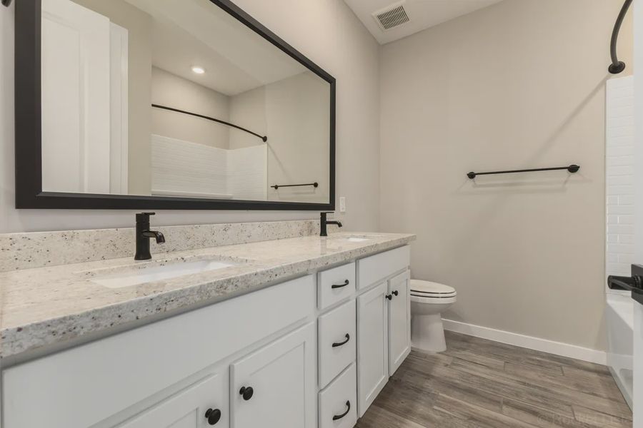 Furnished interior view inside a new home in Forté at Granite Vista, Waddell (Image 12).