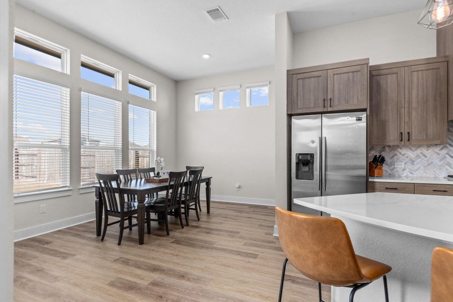 Dining space featuring light wood-style flooring