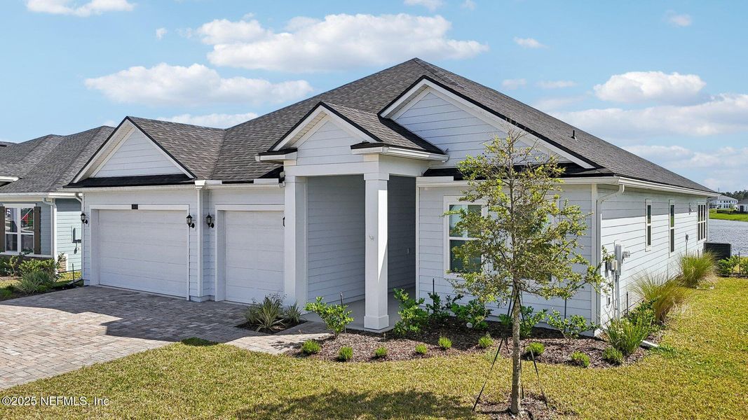 Front exterior of a new home in , St. Augustine, FL, highlighting curb appeal (Image 26). Front exterior of a new home in , St. Augustine, FL, highlighting curb appeal (Image 26).