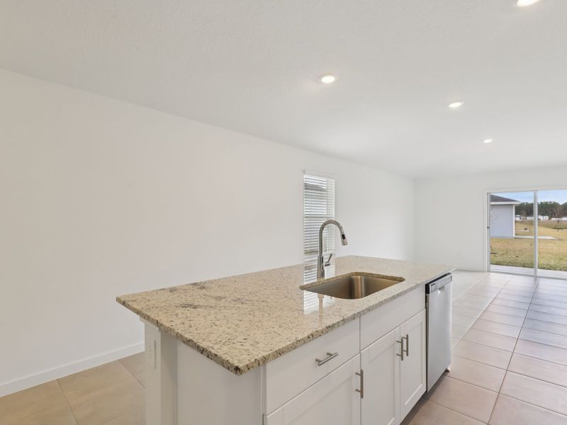 Furnished interior view inside a new home in Flagler Village - Classic Series, Palm Coast (Image 5). Furnished interior view inside a new home in Flagler Village - Classic Series, Palm Coast (Image 5).