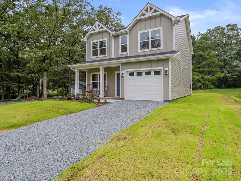 Front exterior of a new home in , Marshville, NC, highlighting curb appeal (Image 1). Front exterior of a new home in , Marshville, NC, highlighting curb appeal (Image 1).