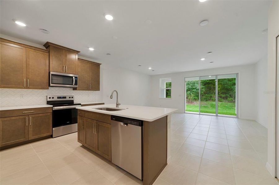 Furnished interior view inside a new home in Towns at Greenleaf, Oviedo (Image 6).