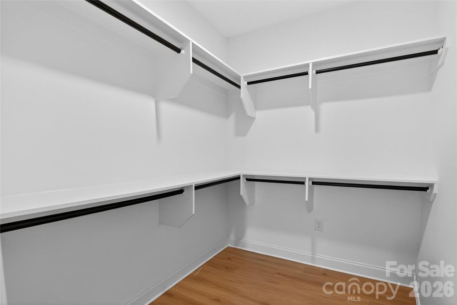 Dual Primary Walk-In Closets