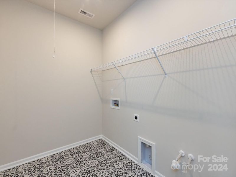 Laundry Room w/ Capped Plumbing for Sink