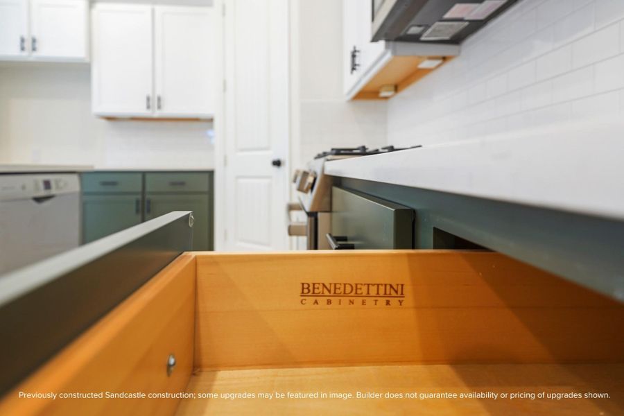 Luxury is in the little things—like these soft-close drawers and custom Benedettini cabinetry that blend beauty with everyday function.