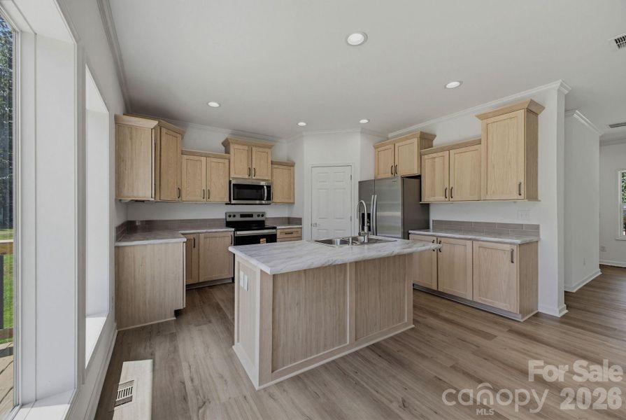 Furnished interior view inside a new home in , Newton (Image 4).