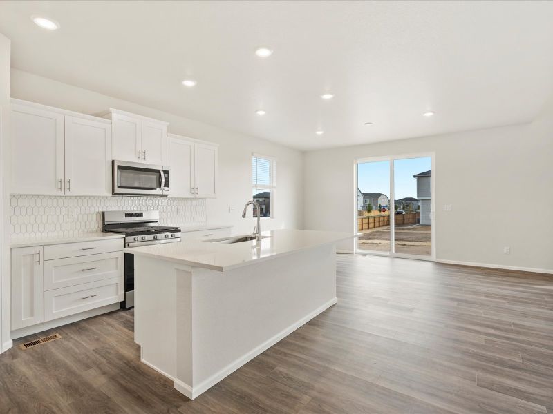 Furnished interior view inside a new home in Buffalo Highlands: The Flora Collection, Commerce City (Image 4).