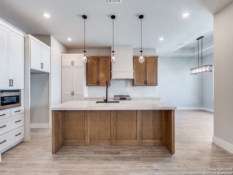 Furnished interior view inside a new home in , San Antonio (Image 8).