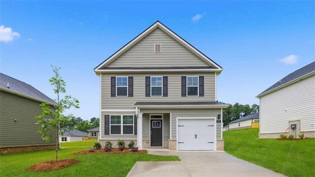 Front exterior of a new home in Willowbrook, Winder, GA, highlighting curb appeal (Image 1). Front exterior of a new home in Willowbrook, Winder, GA, highlighting curb appeal (Image 1).