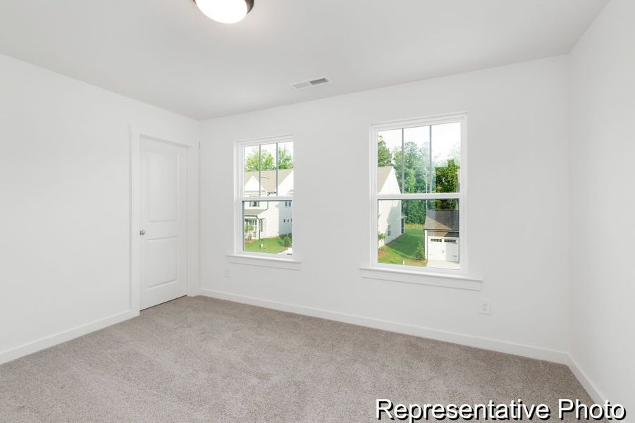 Spacious, unfurnished interior of a new home in Reeves Crossing, St. George (Image 17).