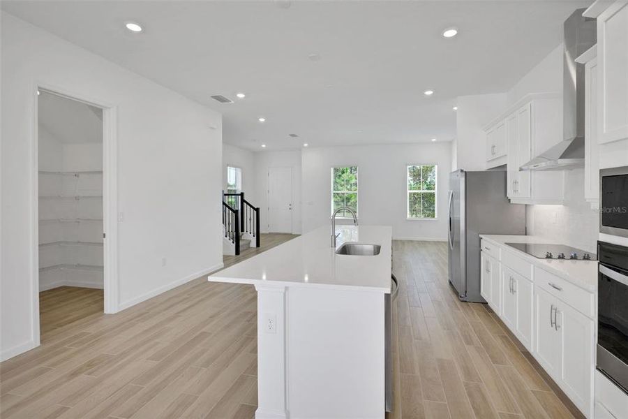 Furnished interior view inside a new home in Serenade at Ovation, Winter Garden (Image 10).