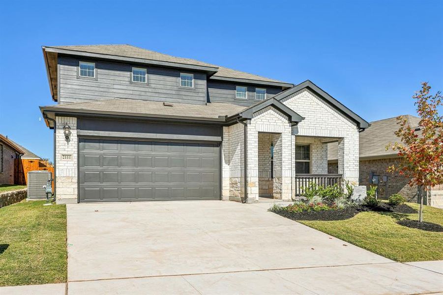 Front exterior of a new home in Westmoor, Sherman, TX, highlighting curb appeal (Image 2). Front exterior of a new home in Westmoor, Sherman, TX, highlighting curb appeal (Image 2).