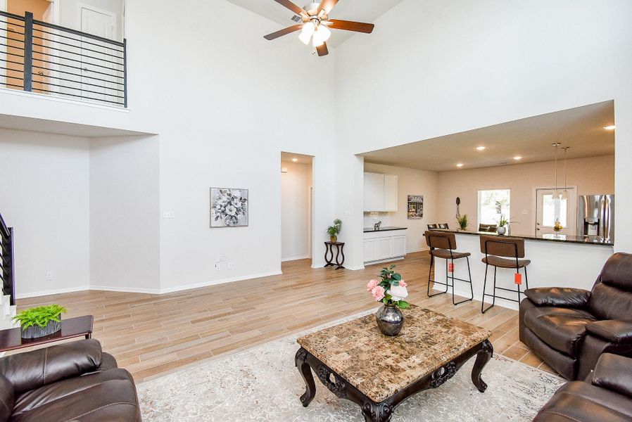 Ceiling fan in the living room for added comfort. Ceiling fan in the living room for added comfort.