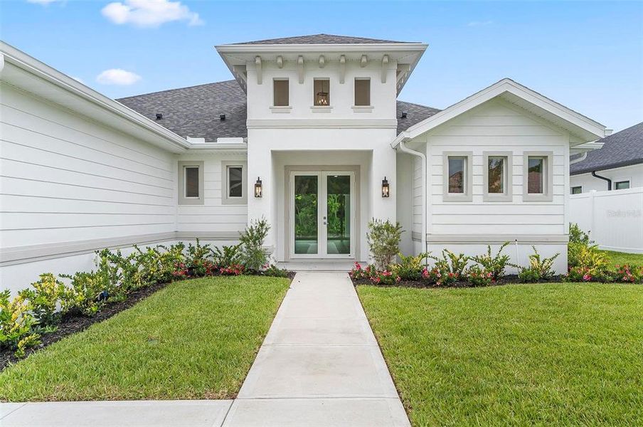 Front exterior of a new home in , Palm Coast, FL, highlighting curb appeal (Image 27).