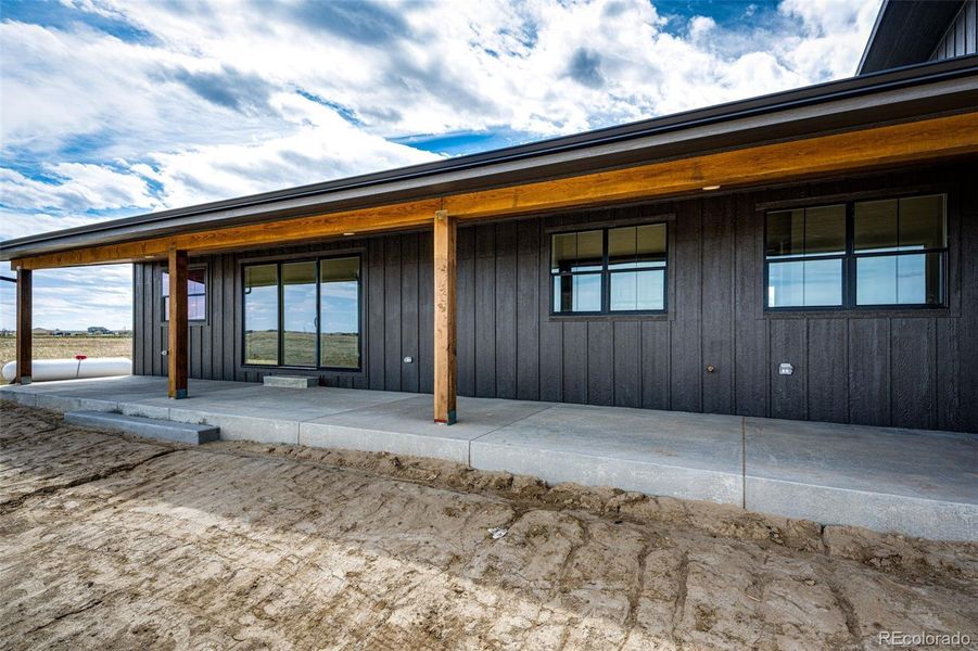 Front exterior of a new home in , Byers, CO, highlighting curb appeal (Image 23). Front exterior of a new home in , Byers, CO, highlighting curb appeal (Image 23).