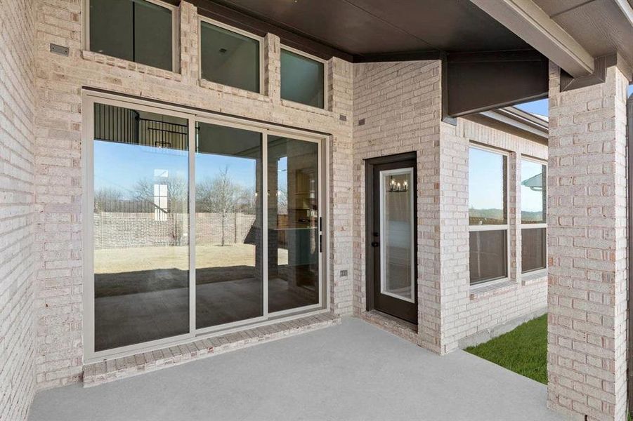 Exterior details and patio area of a home in Valencia on The Lake, Little Elm (Image 3). Exterior details and patio area of a home in Valencia on The Lake, Little Elm (Image 3).