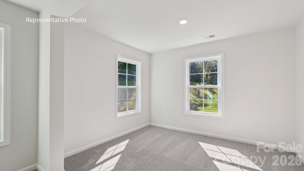 Spacious, unfurnished interior of a new home in Sanctuary at Southgate, Indian Trail (Image 11).