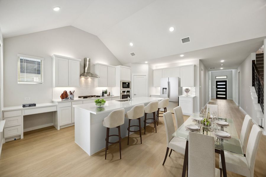Kitchen in the Wimbledon home plan by Trophy Signature Homes – REPRESENTATIVE PHOTO
