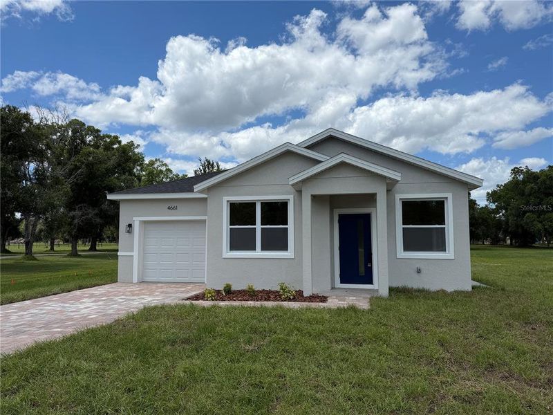 Front exterior of a new home in , St. Cloud, FL, highlighting curb appeal (Image 1). Front exterior of a new home in , St. Cloud, FL, highlighting curb appeal (Image 1).