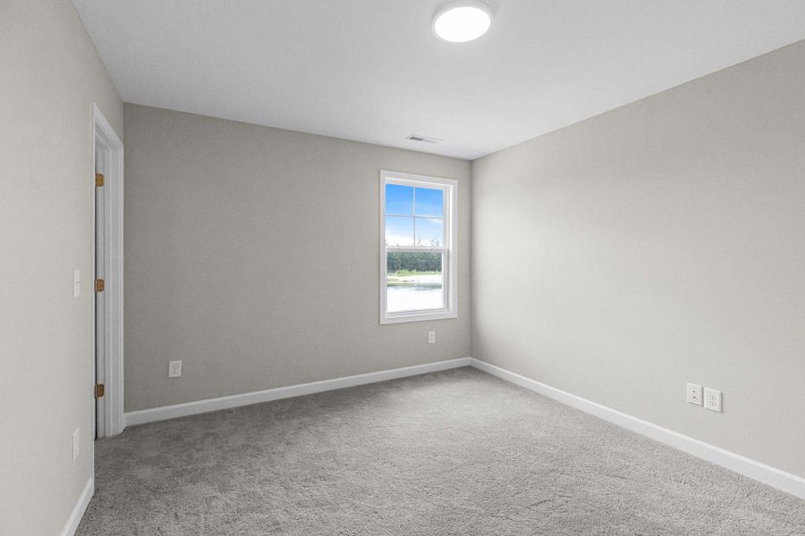 Representative unfurnished interior of a home built from the Magnolia by Caviness & Cates Communities in Bartlett Manor, Youngsville (Image 210).