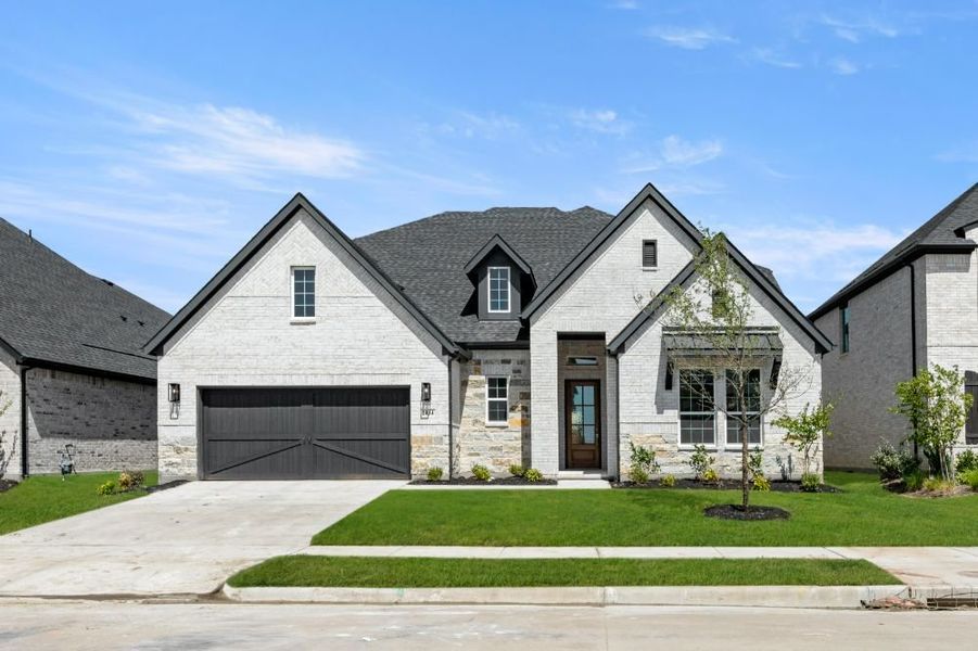 Front exterior of a home in the Cambridge Crossing community, located in Celina, TX (Image 19).