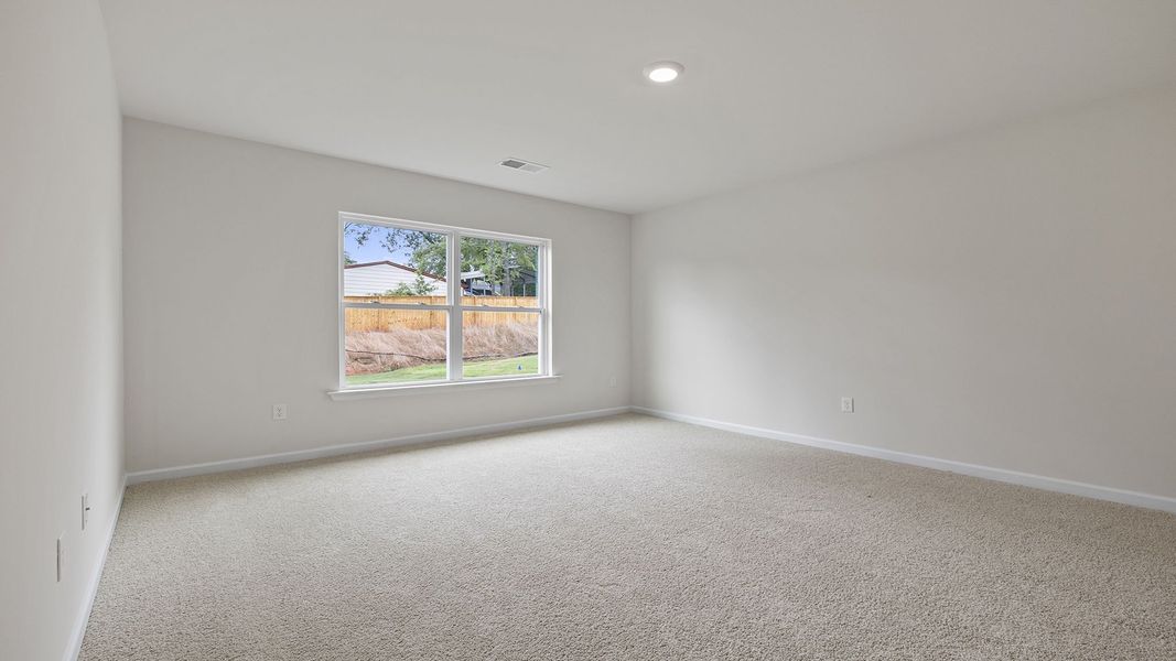 Spacious, unfurnished interior of a new home in Durbin Meadows Traditions, Fountain Inn (Image 24).