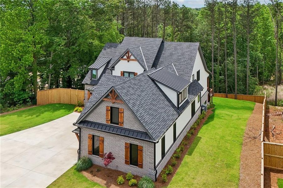 Front exterior of a new home in , Cumming, GA, highlighting curb appeal (Image 34). Front exterior of a new home in , Cumming, GA, highlighting curb appeal (Image 34).