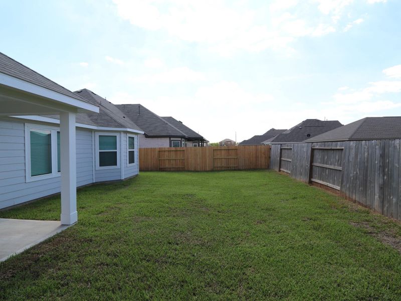 Exterior details and patio area of a home in Miller's Pond, Rosenberg (Image 3).