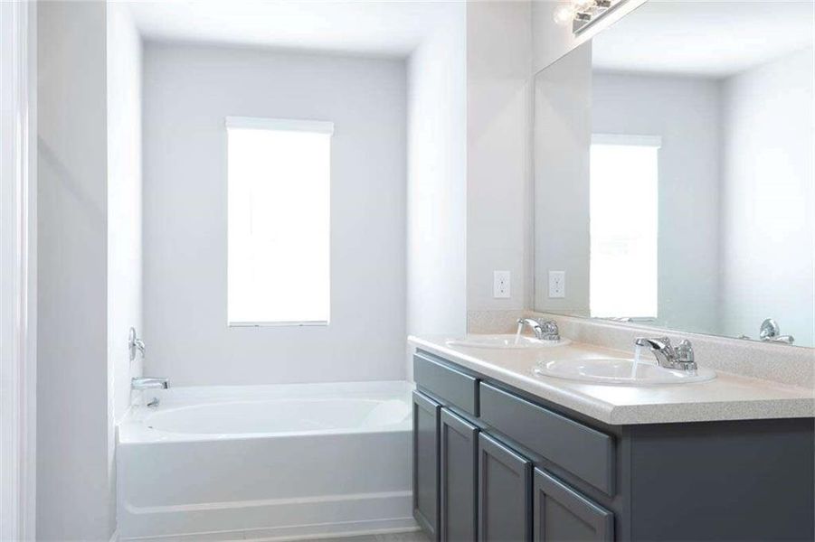 Furnished interior view inside a new home in The Reserve at Calcutta, Stockbridge (Image 37).