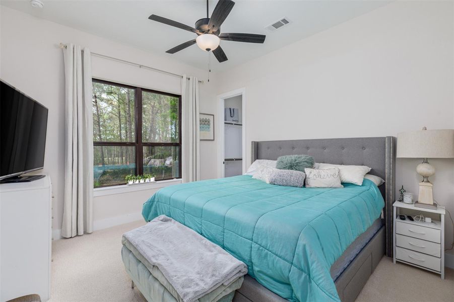 The second auxiliary bedroom also appointed with a large walk-in closet and ensuite bath.
