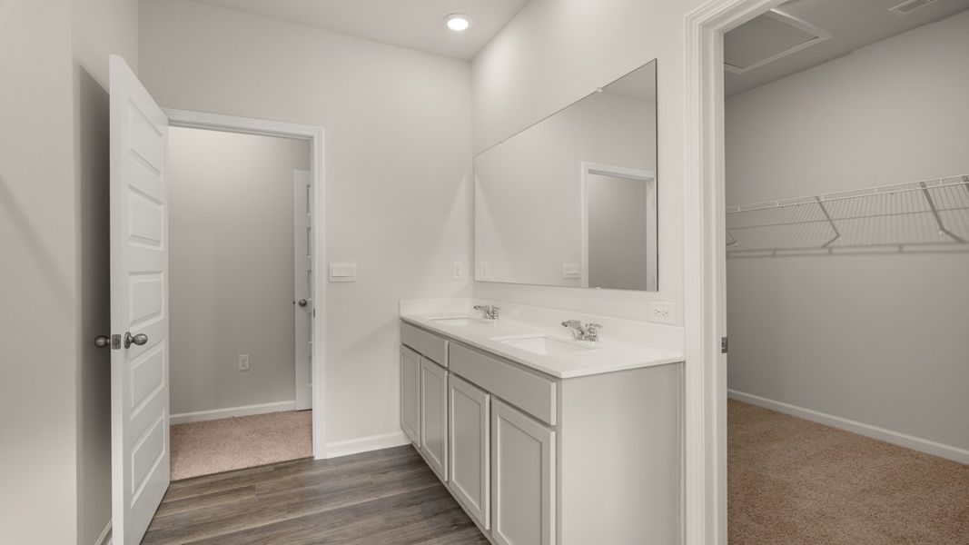 Furnished interior view inside a new home in Preserve at Dove Creek, Statham (Image 13).