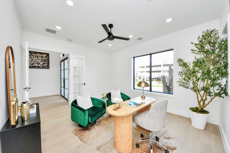 Notice the French glass doors to your private office!