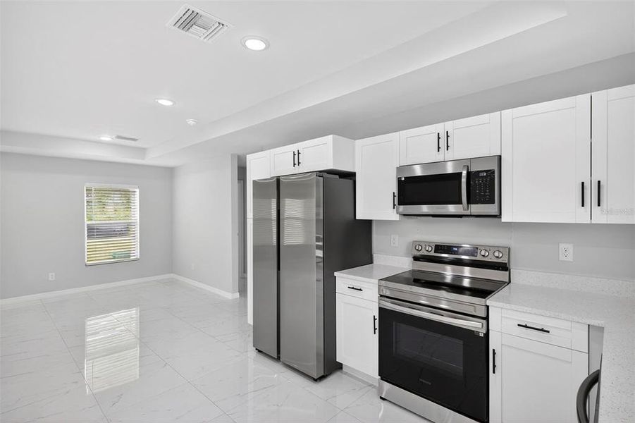 Furnished interior view inside a new home in , Lehigh Acres (Image 6).