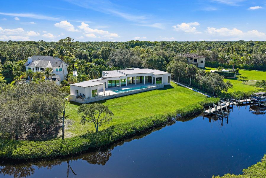 Front exterior of a new home in , Jupiter, FL, highlighting curb appeal (Image 1). Front exterior of a new home in , Jupiter, FL, highlighting curb appeal (Image 1).