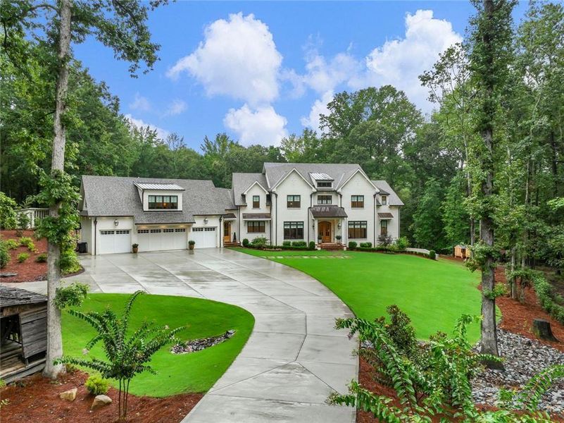 Front exterior of a new home in , Buford, GA, highlighting curb appeal (Image 27). Front exterior of a new home in , Buford, GA, highlighting curb appeal (Image 27).