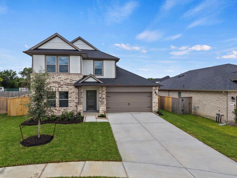 Front exterior of a new home in Laurel Landing, Alvin, TX, highlighting curb appeal (Image 19).