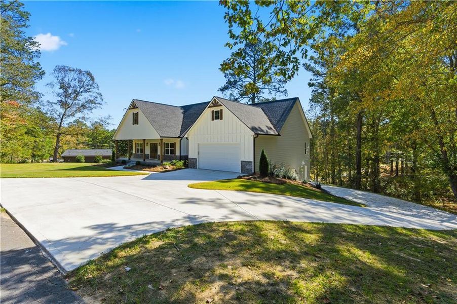 Front exterior of a new home in , Dallas, GA, highlighting curb appeal (Image 26).